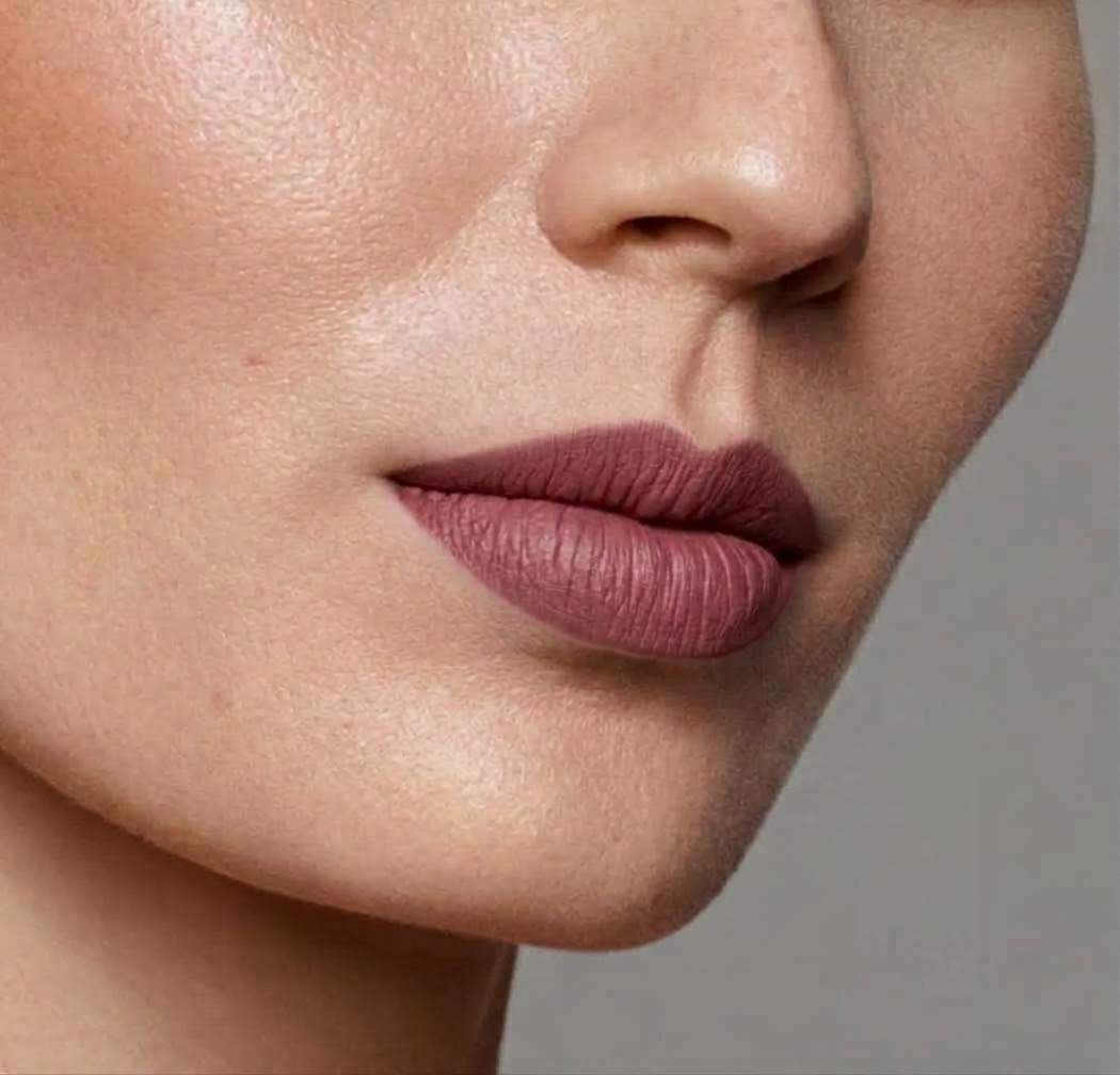 LILIPANI Lippy in a Bottle matte liquid lipstick in Devotion, a berry mauve, on lips